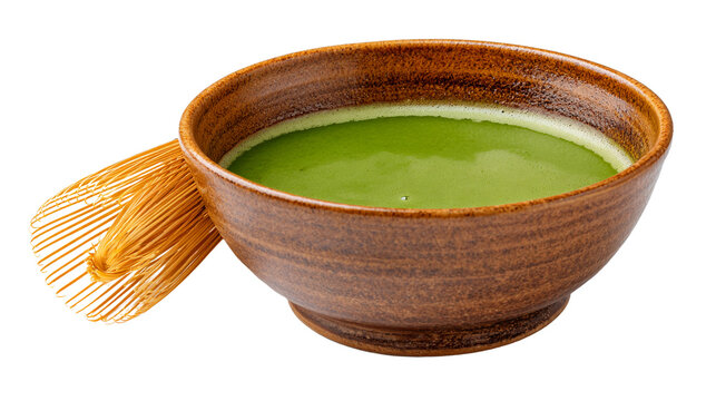 Matcha green tea liquid in ceramic bowl with bambo whisk for detox superfood, isolated cutout