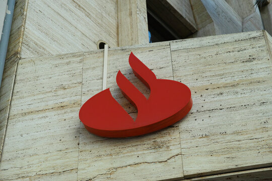 VALENCIA, SPAIN FEBRUARY 6, 2026: Santander bank flame logo on wall
