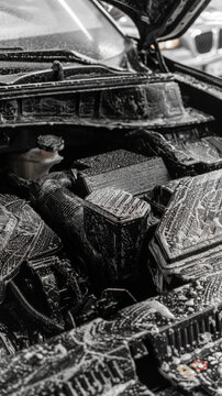engine and engine compartment of a car during washing. foam applied. car wash, detailing studio