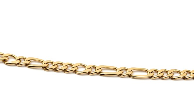 Fragment of a gold figaro chain necklace, showing its distinct link pattern on white