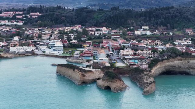 Aerial Drone View of Famous Canal D'Amour and Sidari Village in Corfu Greece with Unique Sandstone Rock Formations and Turquoise Ionian Sea During Overcast Day