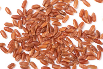 closeup of raw rice on white background