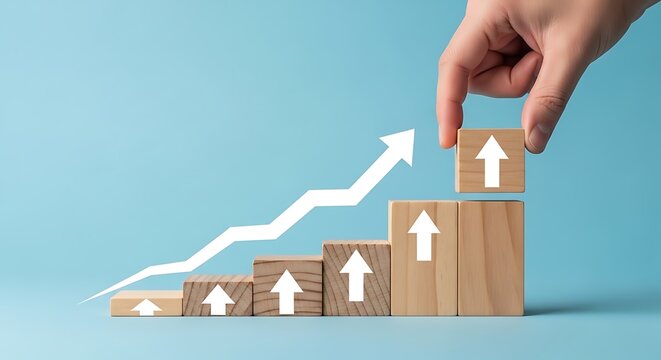 Hand placing wooden block with upward arrow symbolizing steady business progress, strategic growth achievement, and continuous improvement in performance metrics