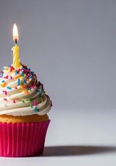 A vibrant birthday cupcake featuring creamy frosting, abundant colorful sprinkles, and a cheerful lit candle symbolizing celebration and joy, food, sweet, cake