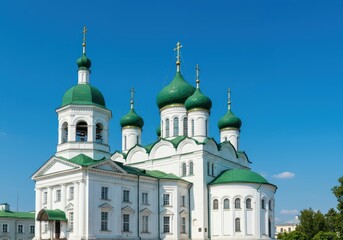 Fototapeta premium Stunning neoclassical white church with prominent green domes set against a perfect bright blue summer sky, church, travel, neoclassical
