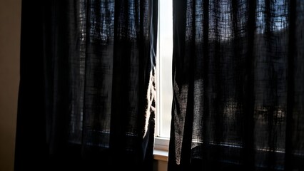 SunlightThroughDarkCurtains