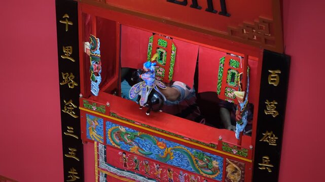 The Wayang Potehi show is a Chinese puppet show performed with hand-operated puppets on a small stage. Jakarta, February 8, 2026.