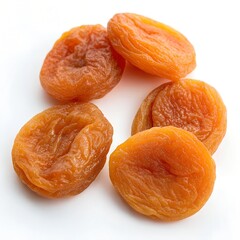 Dried apricots in vibrant orange hues on white background