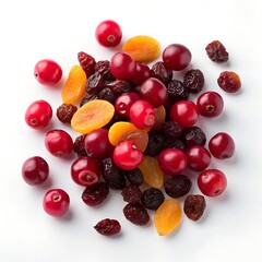 assorted dried and fresh cranberries and apricots on white background