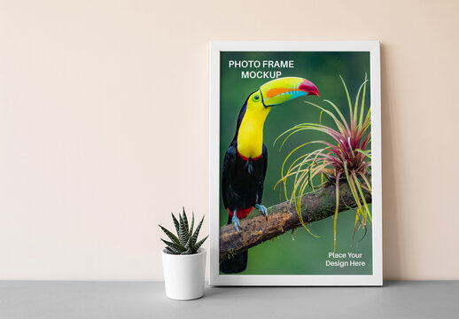 Vertical Photo Frame Mockup with Succulent Plant