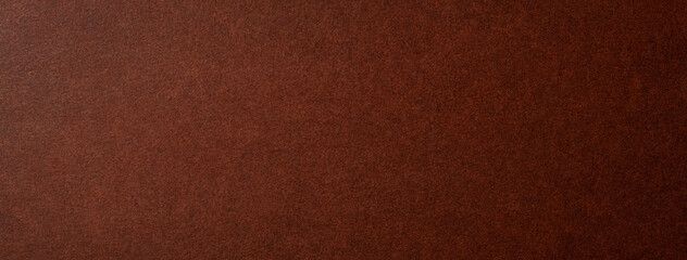レザー調の質感のある茶色い紙の背景テクスチャー