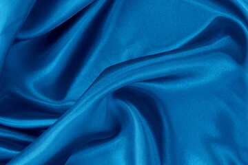 Obraz premium Blue fabric cloth texture for background and design art work, beautiful crumpled pattern of silk or linen.