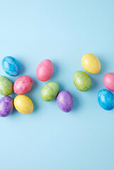 Colorful Dyed Easter Eggs on Blue Background