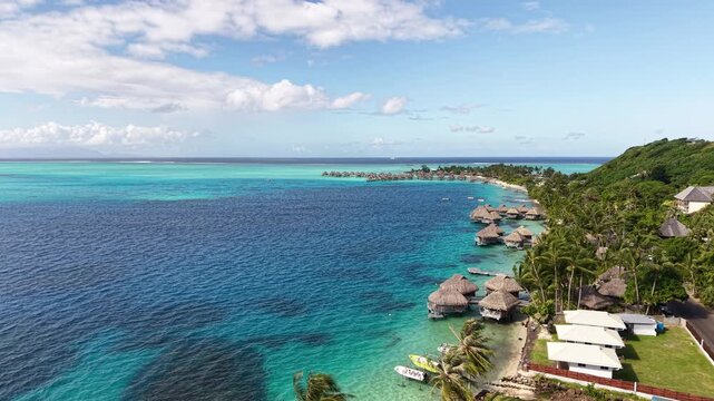 Bora Bora, French Polynesia. Establishing Drone Shot of Coastal Village and Tropical Resort