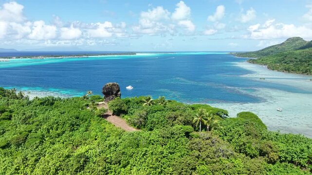 Bora Bora Island, French Polynesia, Drone Shot of Finger of God, Rock Landmark and Viewpoint Above Lagoon