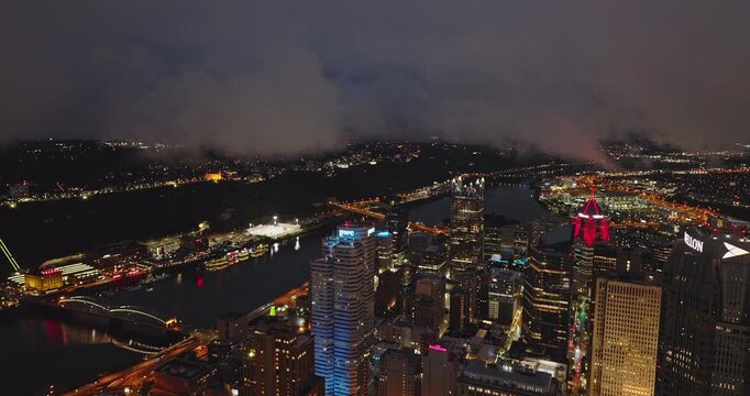 Pittsburgh Pennsylvania Aerial v35 flyover downtown area capturing the Monongahela river, South Shore cityscape, and low clouds shrouding night lights - Shot with Inspire 3 8k - Sept 24th 2023
