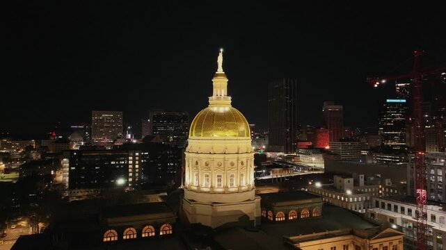 Point of view of the Georgia State Capital at night by drone