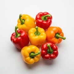 Vibrant arrangement of whole fresh bell peppers, including red, yellow, and orange colors, harvested produce ready for healthy cooking, fresh, natural, arrangement
