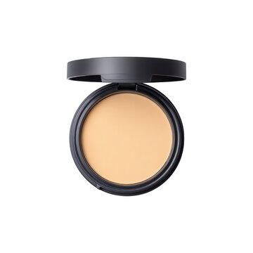 Cream foundation in an open black powder compact, isolated on a dark backdrop