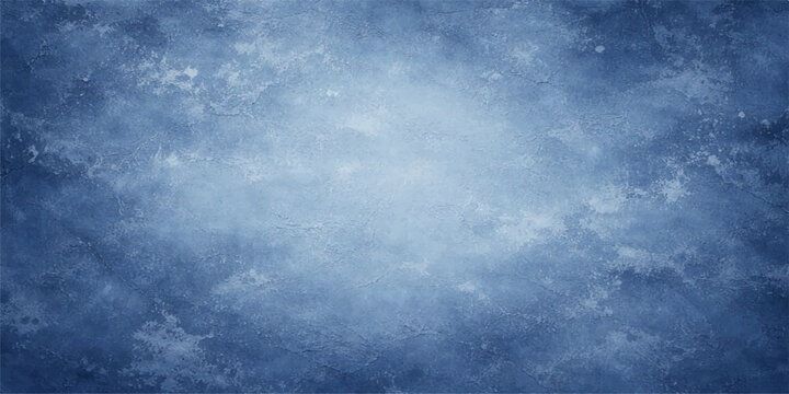 A dark blue grunge texture merges with a stormy cloudscape and abstract light to create a dramatic nature background featuring a moody blue sky filled with white clouds and heavy air