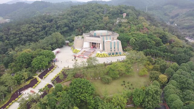 Memorial Hall Aerial View Surrounded by Forest and Mountains