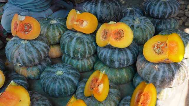 Fresh Green Kabocha Squash Pumpkin Displayed in Vibrant Market