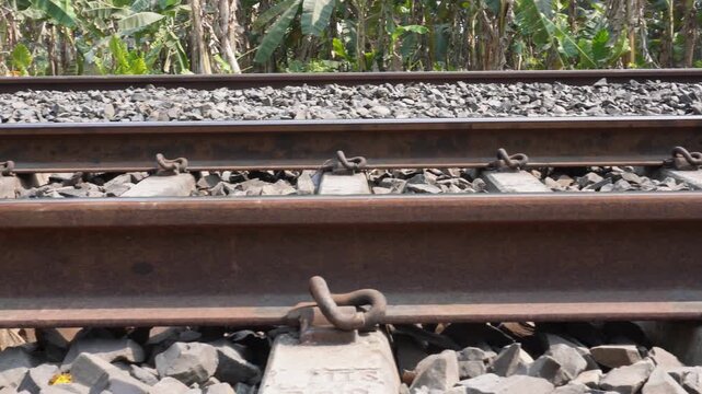 Close-Up Railway Tracks Metal Rails Concrete Sleepers Ballast