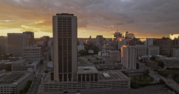 Richmond Virginia Aerial v99 cinematic flyover Shockoe Bottom capturing downtown urban cityscape, featuring James Monroe building at sunset golden hour - Shot with Mavic 3 Pro Cine - Sept 30th 2023