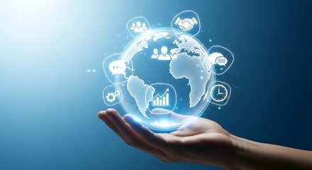 Fototapeta premium A hand holding a holographic globe with various icons representing global connectivity and data