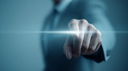 A close-up, first-person perspective of a person's hand (wearing a grey business suit) reaching forward to touch a bright, horizontal beam of light.
