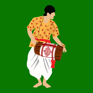 Assamese Bihu Dancer( Dhuliya) in traditional attire with his Dhol
