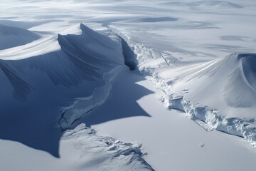 Fototapeta premium Deep blue glacier crevasse splitting the frozen ice surface with a dangerous crack. Climate change reports, environmental protection campaigns, business risk , insurance ,science documentaries.