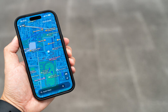Using Apple Maps on iPhone 17 Pro for Navigation in Bangkok. modern travel technology, urban navigation, mobile GPS applications, and smart city exploration in Thailand.