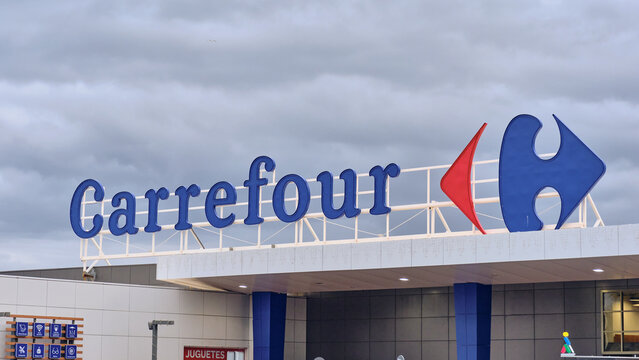 The Carrefour supermarket sign in Estepona Spain The sign is blue and red and is located on the exterior of the building.