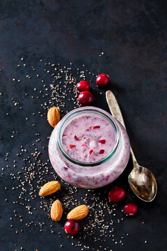 Dessert of chia seeds, almonds and cranberries