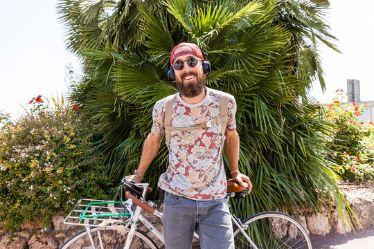 Smiling mature man with bicycle