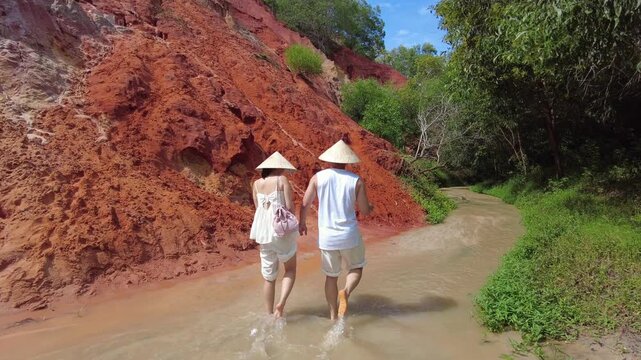 Asia, Vietnam, Mui Ne 02,10,2026 The "Fairy Stream" , is a natural attraction where you walk barefoot in a shallow stream, characterized by water flowing over colored sand and clay, creating a surreal