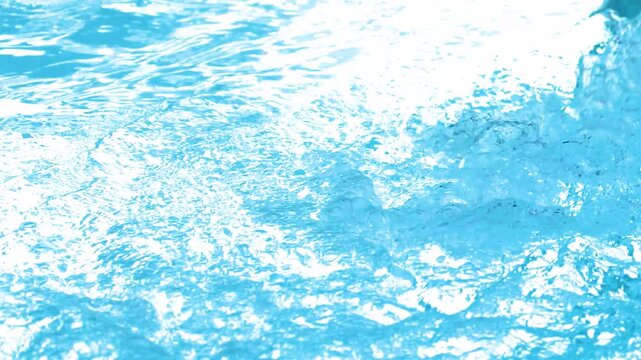 Close Up of Blue Swimming Pool Water Circulating and Bubbling