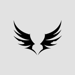 Obraz premium A black bird like logo on a gray background