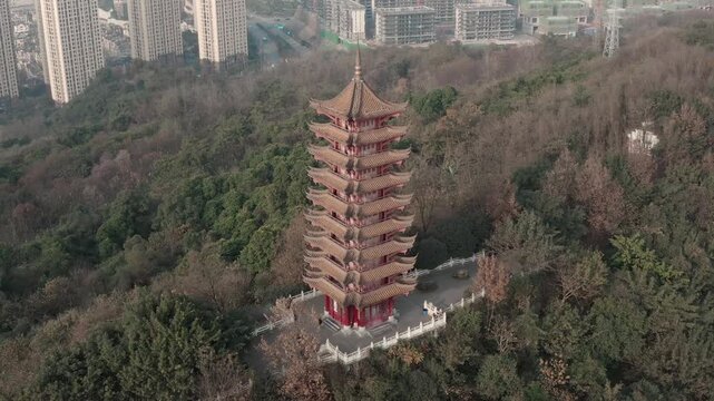 Ancient Chinese Pagoda Aerial View with Forest and City Skyline
