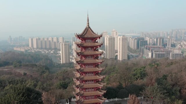 Ancient Chinese Pagoda Over Modern City Skyline Aerial View