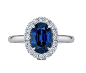 A white gold ring with a blue sapphire and diamonds.