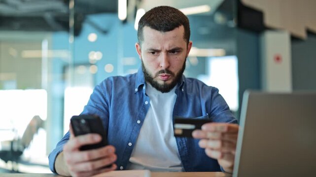 Online payment issues faced. Confused, worried expression. Credit card and phone used for difficult digital transaction. Frustration and disappointment evident during financial process.