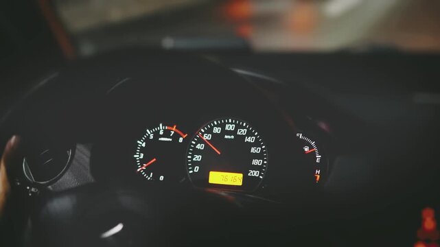 Car Dashboard Gauges and Speedometer Close-Up