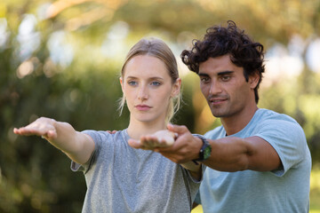 Fototapeta premium happy couple doing sport in the park
