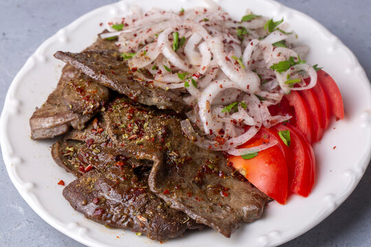 Traditional Turkish Liver kebab cuisine. Leaf Liver spicy. Delicious turkish ciger. (Turkish name; yaprak ciger)