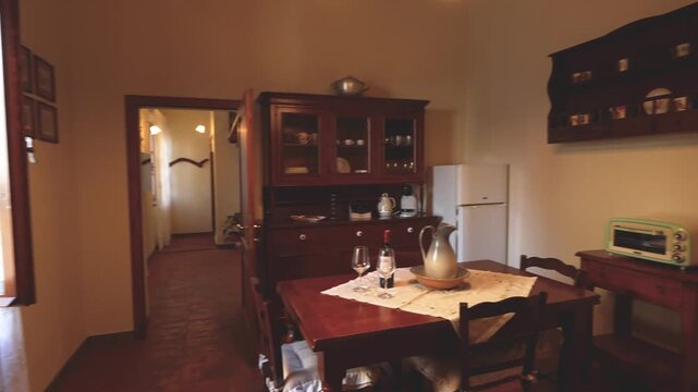 Cozy Tuscan B&B apartment showcasing rustic style, wooden beams, and traditional Italian design