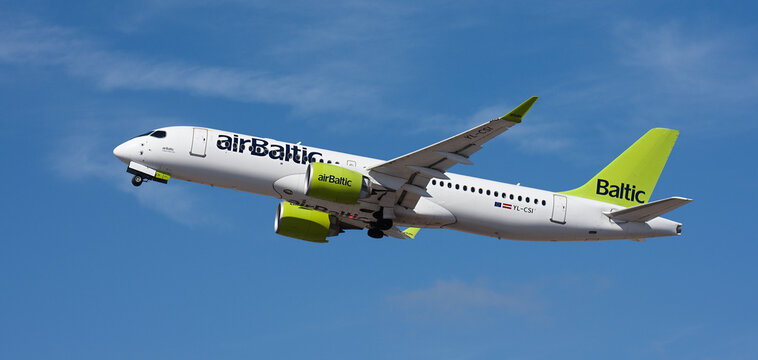Tenerife, Spain february 6st, 2026. Airbus A220-300 airBaltic airlines, flies in the blue sky. Takeoff at Tenerife Airport