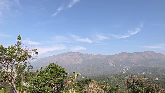 Scenic view of mountains and lush greenery in Mannar, Kerala
