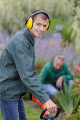 Fototapeta premium close up of a smiling young man gardener